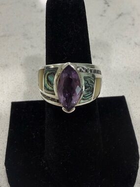 Sterling Silver Ring with Marquise Amethyst and white topaz gemstones on sides